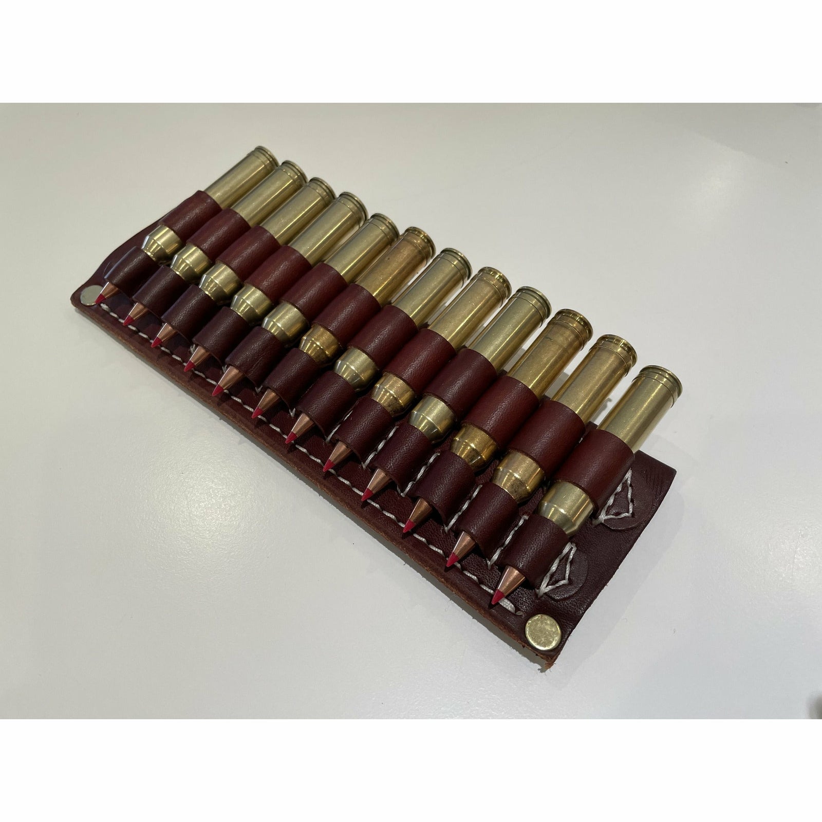 Patronhållare för bälte 12