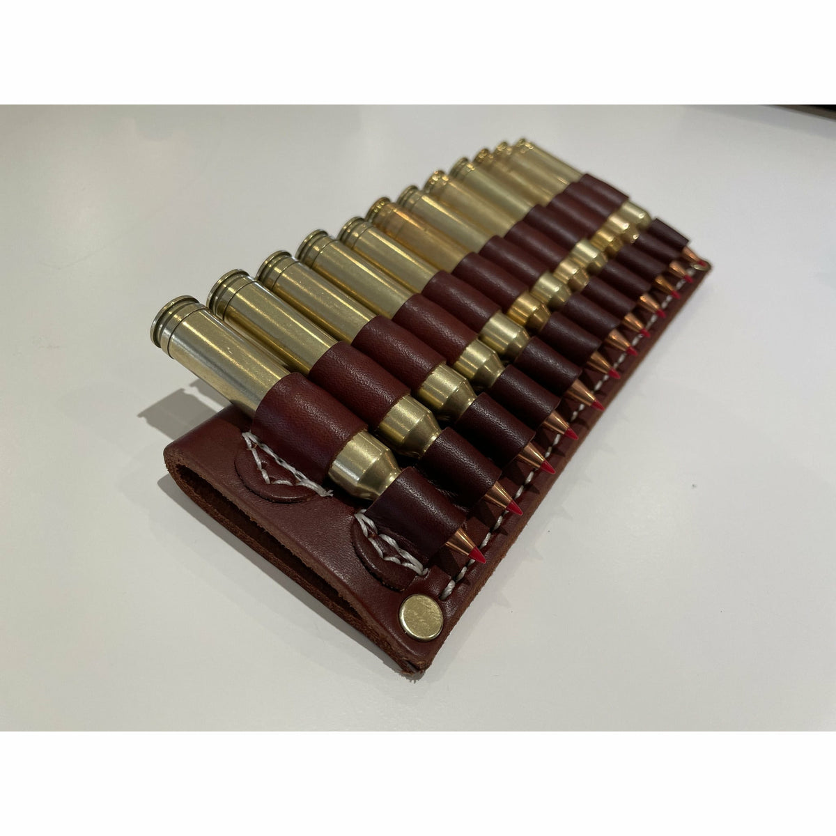 Patronhållare för bälte 12